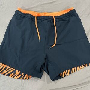 Men's Black and Orange Tiger Stripe Shorts 🐅